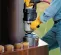 Silver and black Ingersoll Rand 1-1/2 inch drive Air Impact Wrench being used to remove very large bolts