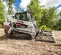White, black and orange BOBCAT 2,000-2,400 lb. Compact Track Loader