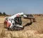 White, black and orange BOBCAT 2,000-2,400 lb. Compact Track Loader