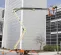 Beige and orange JLG Boom