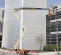 Beige and orange JLG Boom